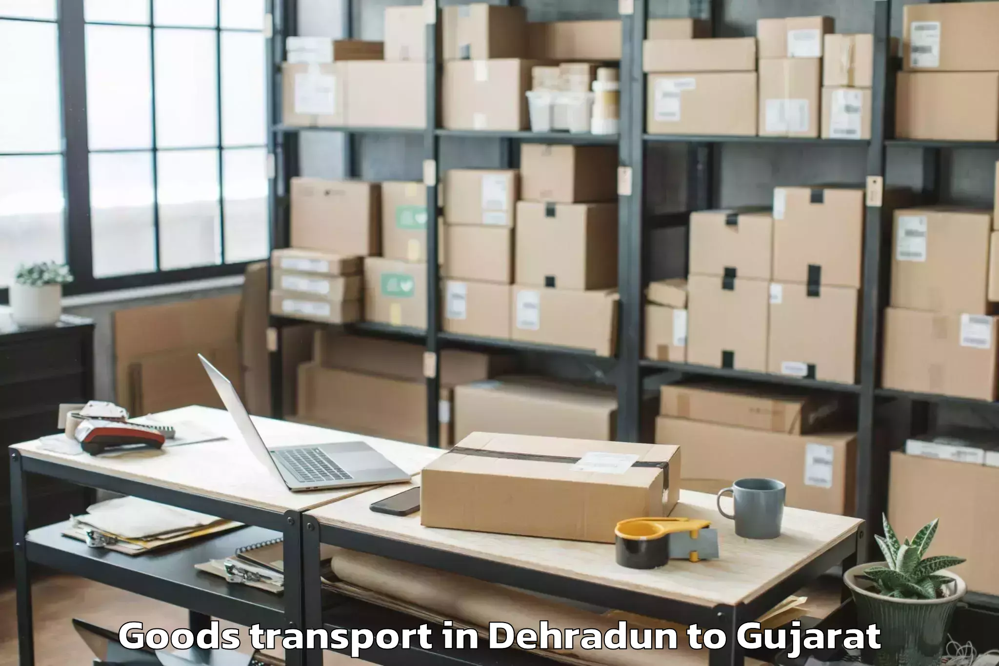 Get Dehradun to Gujarat University Of Transpla Goods Transport